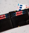 Poziomy portfel męski z kolorową lamówką — Peterson