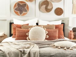 Bawełniana poduszka dekoracyjna z frędzlami ⌀ 45 cm beżowa MADIA